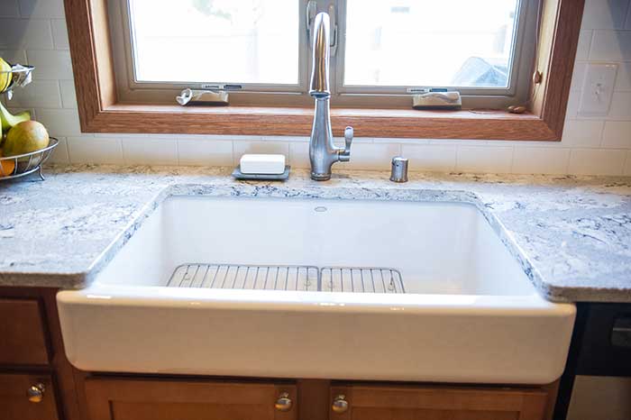 Farmhouse sinks add a feeling of nostalgia to a kitchen in Madison, WI