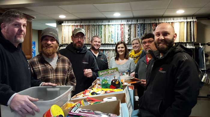 The team packed more than 20 boxes of food in Madison, WI