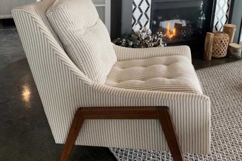 Chair near fireplace