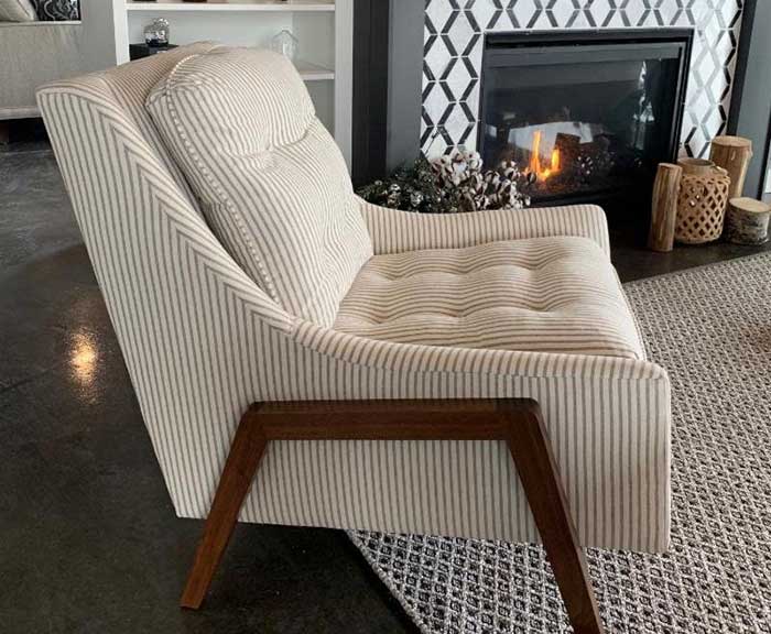 Chair near fireplace